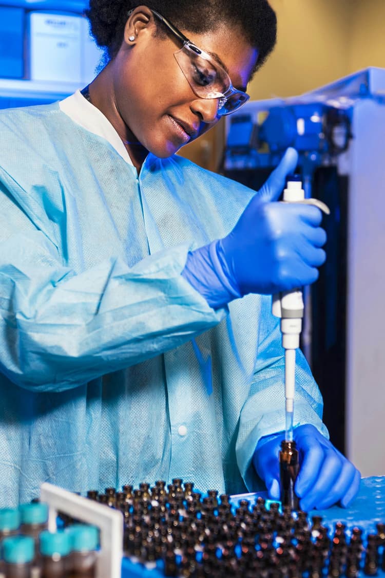 Healthcare professional preparing medical samples